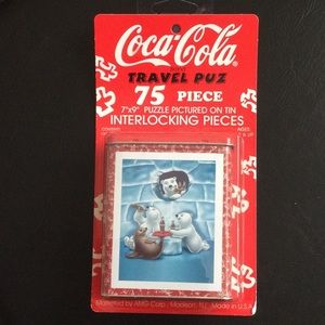 CocaCola 75 piece puzzle in a tin